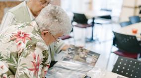 Two residents during a scrapbooking activity
